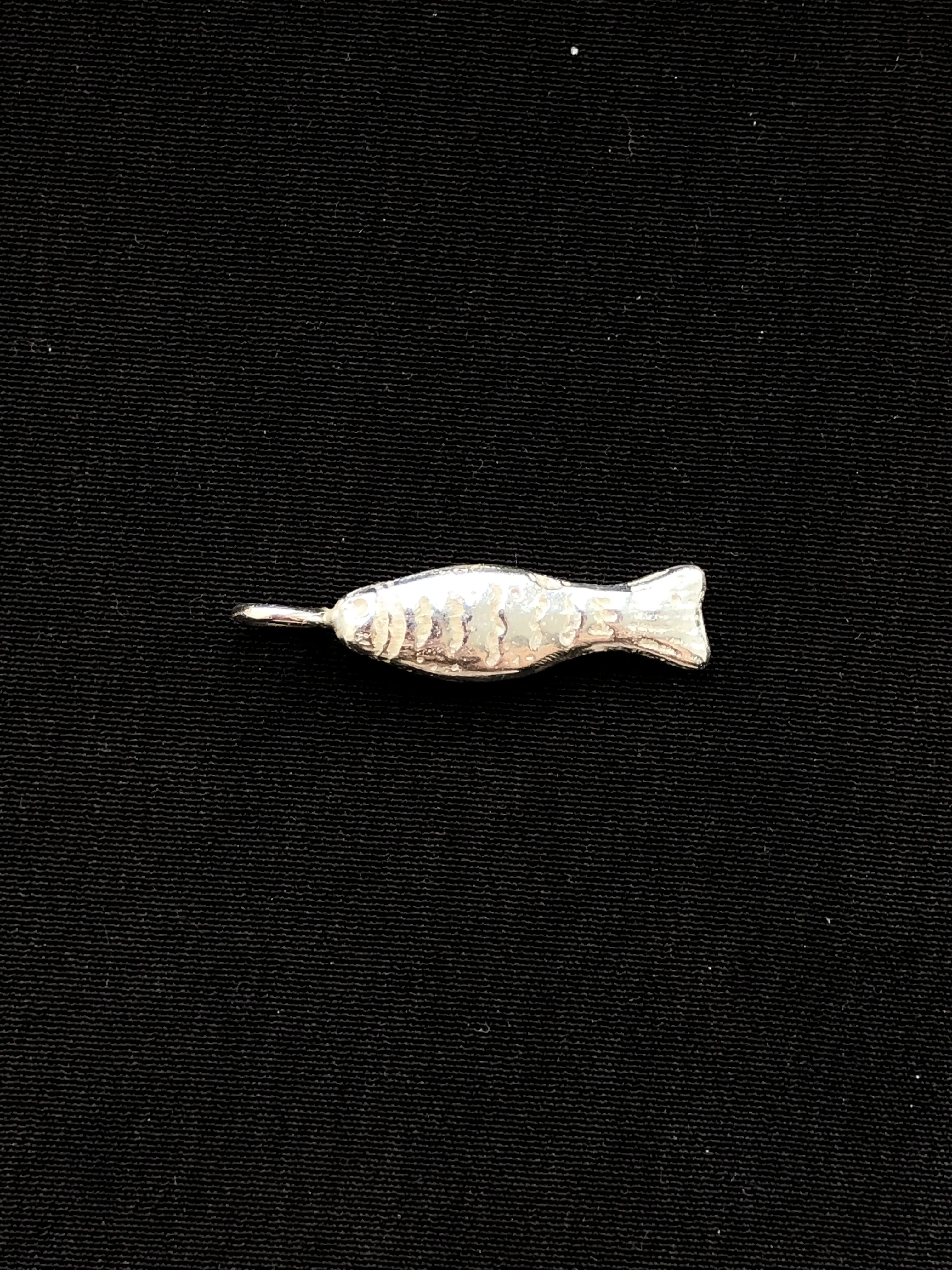 Fish charm detail