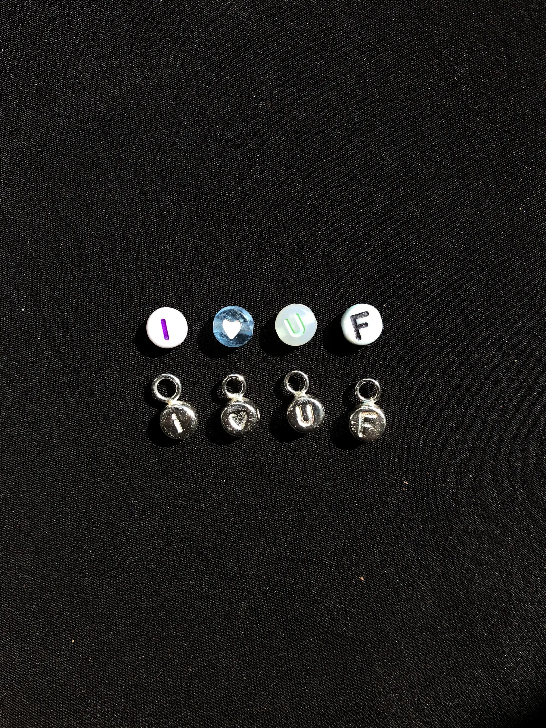 Letter beads spelling I love uf